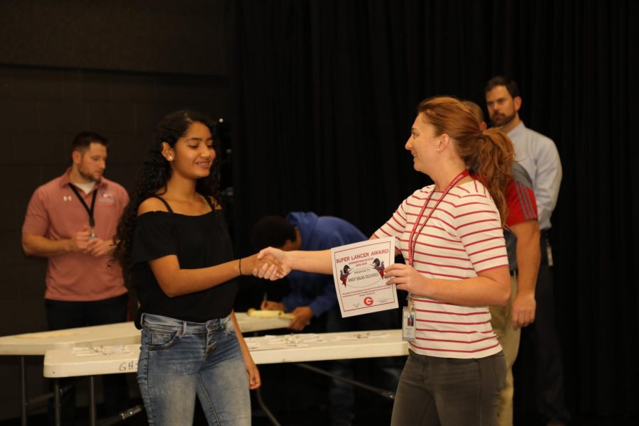 Ms. Holtz congratulates her Super Lancer, who was one of 19 Lancers selected for this honor. 