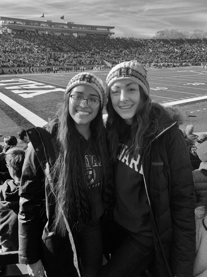 Granger alumna Jelena Dragicevic (R) attends a Harvard vs. Yale football game with her roommate, Leilani Wesley (L). Dragicevic wants Lancers to aim high.