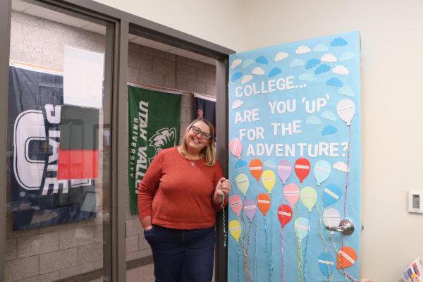 Ms. Oliver decorated her office door for college week at Granger High