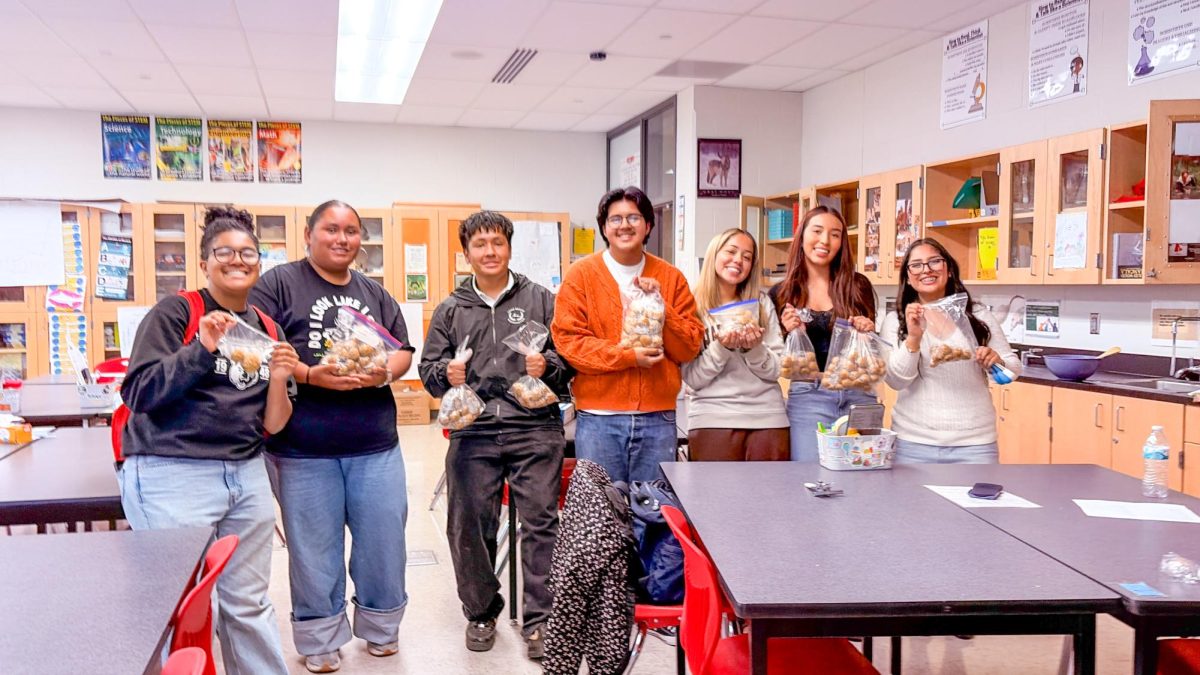 Granger High NHS members craft treats for local animal shelter