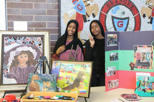 Hamda and Ekra invite Lancers to join BSU at Club Rush in the Commons. Almost 30 curious students dropped by the BSU booth. (PC: Hawa Ahmed/TCT)