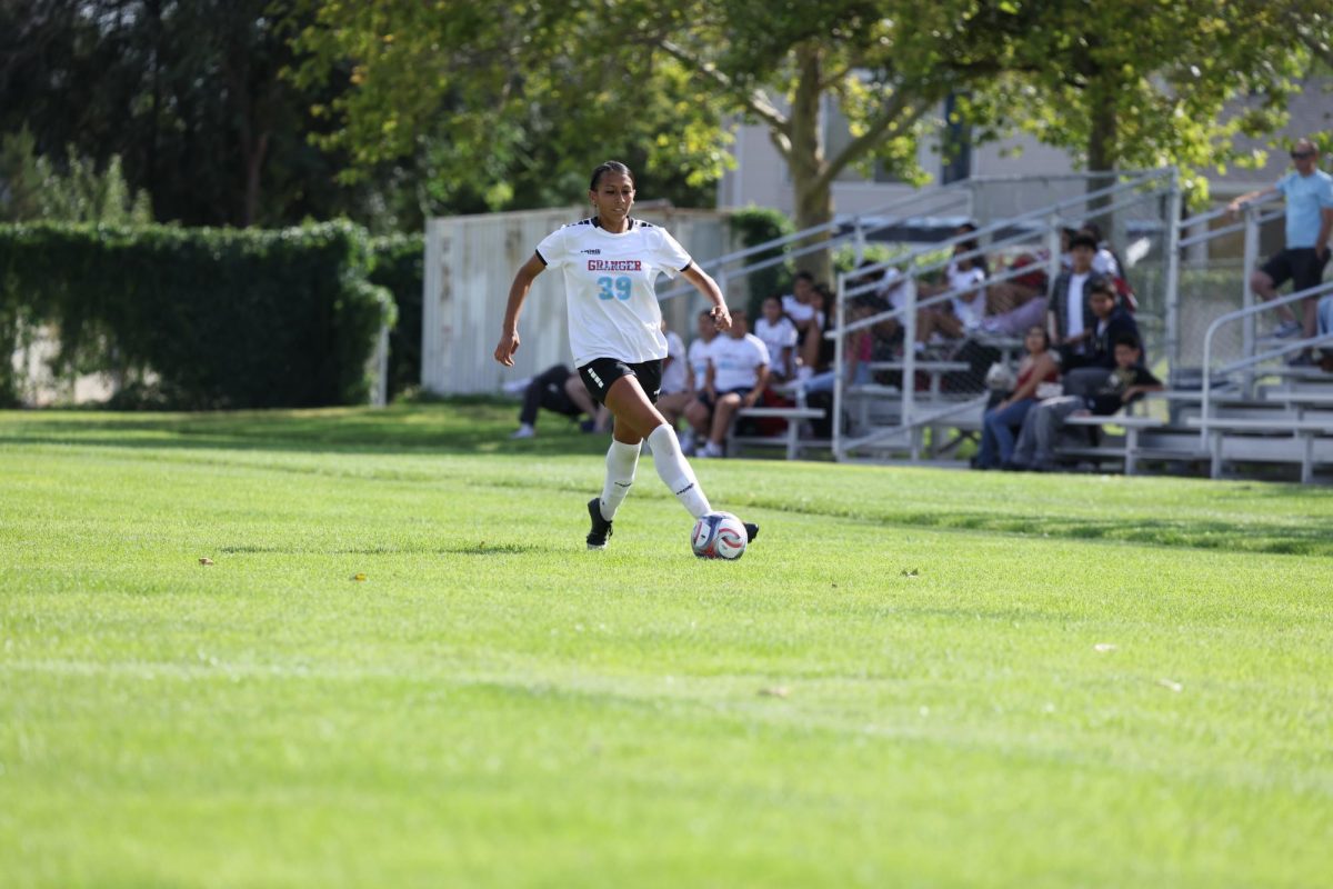 Daniela moves the ball along the touchline against Kearns on Cougar turf on August 25, 2026 (PC: John Barkpile/stringer)